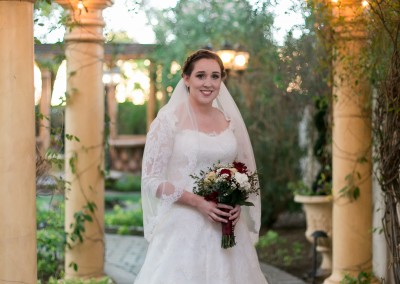 Garden Tuscana Reception Hall event in Mesa showing bride under gazebo in garden
