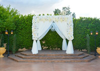 Garden Tuscana Reception Hall event in Mesa showing outdoor altar area