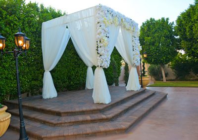 Garden Tuscana Reception Hall event in Mesa showing outdoor wedding ceremony and altar