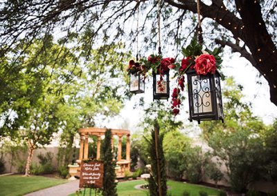 Garden Tuscana Reception Hall event in Mesa showing outdoor wedding ceremony lantern decor