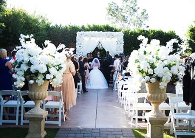 Garden Tuscana Reception Hall event in Mesa showing couple's wedding ceremony in garden