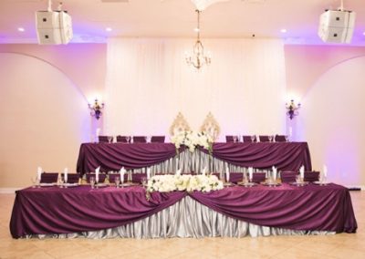 Garden Tuscana Reception Hall event in Mesa showing head table in ballroom reception