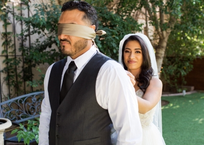 Garden Tuscana Reception Hall event in Mesa showing blindfolded groom with bride