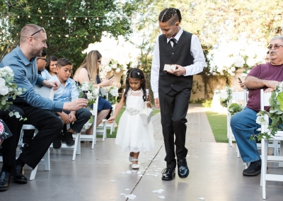 Garden Tuscana Reception Hall event in Mesa showing ring bearers in outdoor ceremony