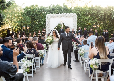Garden Tuscana Reception Hall event in Mesa showing couple just married in outdoor ceremony