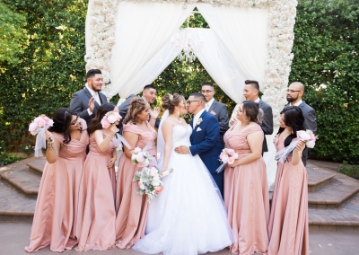 Garden Tuscana Reception Hall event in Mesa showing couples first kiss at the altar
