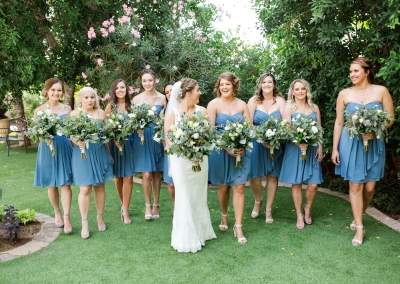 Garden Tuscana Reception Hall event in Mesa showing bridal party photo shoot in garden