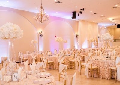 Garden Tuscana Reception Hall event in Mesa showing wedding reception decorated in champagne and ivory