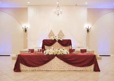 Garden Tuscana Reception Hall event in Mesa showing head table in ballroom reception