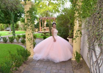 Garden Tuscana Reception Hall event in Mesa showing Traditional Quinceanera Ceremony Service in Outdoor Garden