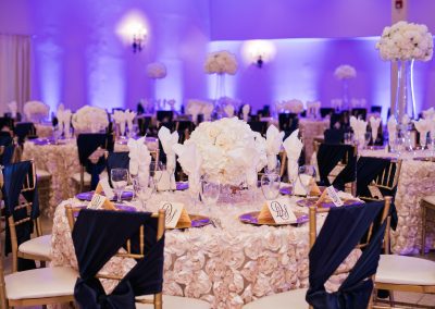 Garden Tuscana Reception Hall event in Mesa showing beautiful white rose and deep blue wedding decor